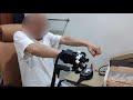 Stroke patient is using techcare hand robot hr30