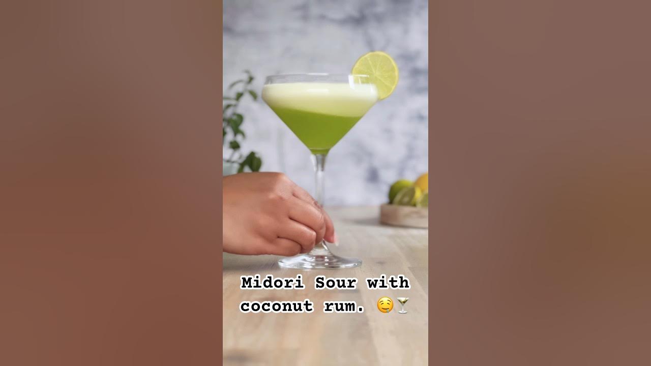 Midori Sour with Coconut Rum.🍸 Delicious tropical cocktail. 