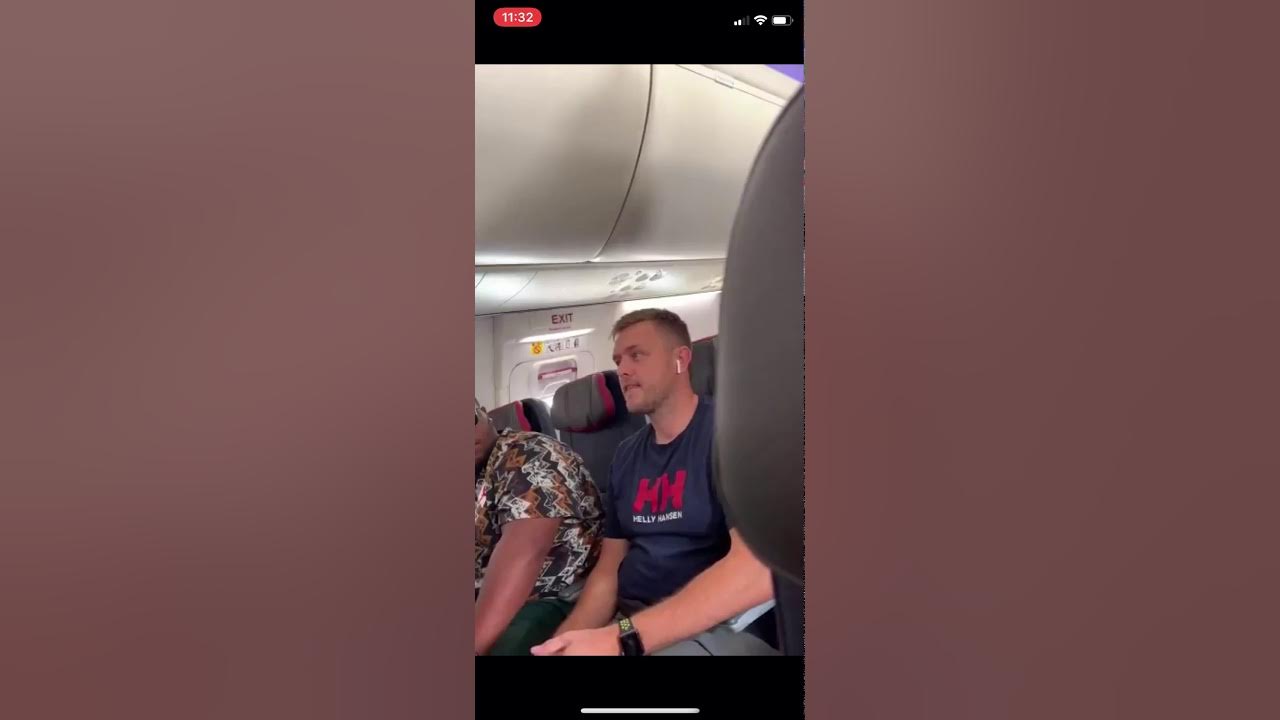 Fight on the plane lady throws laptop YouTube