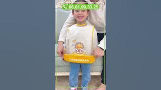 مريلة الأطفال تساعد على تقليل الفوضى وتحمي الملابس من البقع