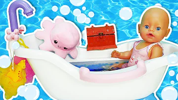 Baby doll bath time & evening routine. Toy tube for Baby Born doll & baby shark toys.