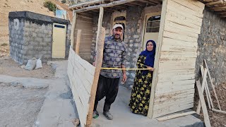 A stone porch in the mountains; does the waterway protect Ahmad and Farideh's house?