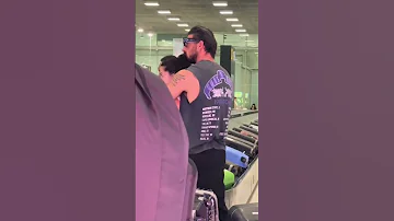 MICHELE MORRONE WITH HIS GIRLFRIEND AT THE AIRPORT 