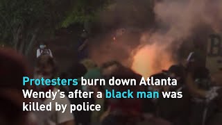 Protesters shut down a highway and set fire to wendy’s restaurant in
atlanta, georgia on saturday, where black man was shot by police
during an arrest on...