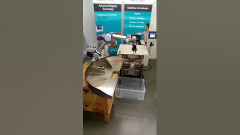 Robotic arm loading bagging machine - full automation solution