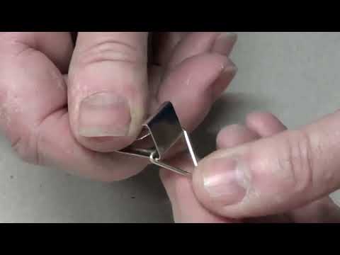 Video: Dove posizionare il gancio in filo metallico sulla cornice?
