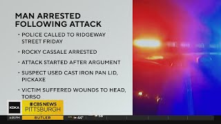 1 injured, suspect arrested after pick-axe attack