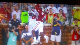 Amazing hugging football catch Ohio state buckeyes