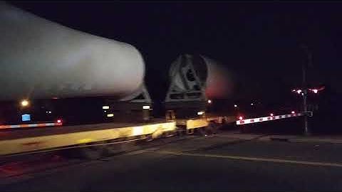 2 UP SD70M #4278 & #4402 lead a northbound mostly loaded windmill blade train.