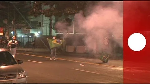 Protesters clash with police during Confederations Cup final in Brazil
