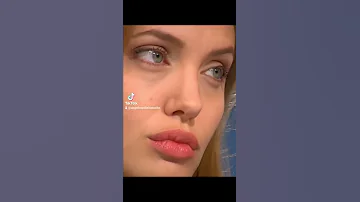 Angelina Jolie plays with her lips