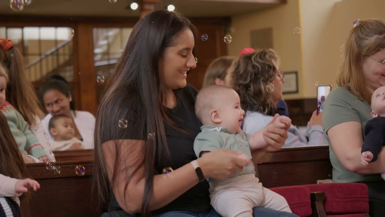 Highlights video of family concert, 2 singers and a pianist performing to audiences of adults, babies and children in different venues.