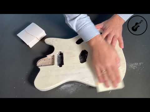 reparación poro de madera guitarra