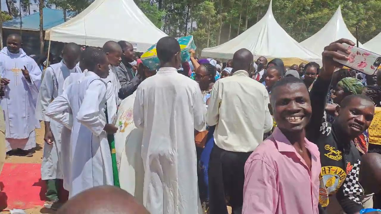 Steve Kay _ Perfoming in Mwibale, Fr Geoffrey thanks giving.