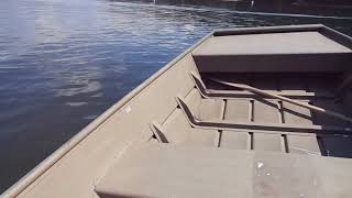 Mercury 25 HP  on 14 ft Jon boat.