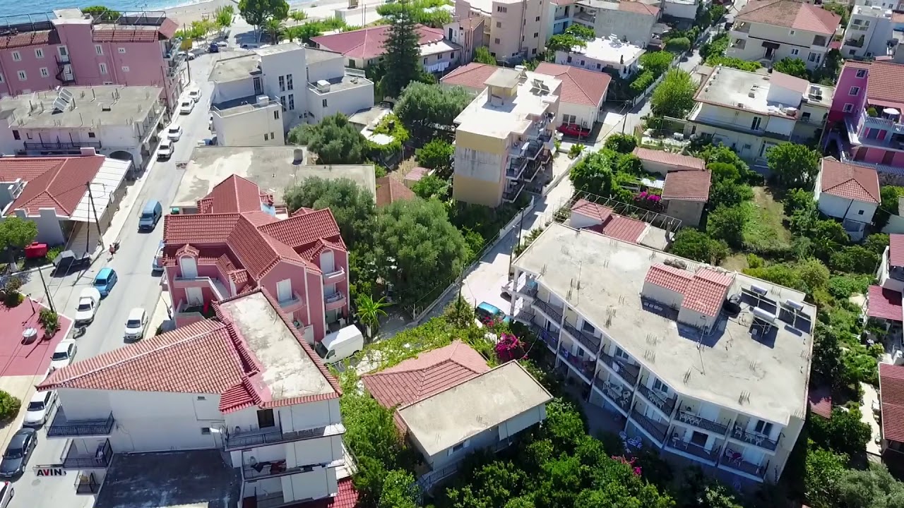 Poros from above plateia city and pool view - YouTube