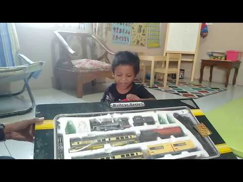 A high-speed train with maaaany cars is arriving at Lego City railway station. Have a look at the st. 
