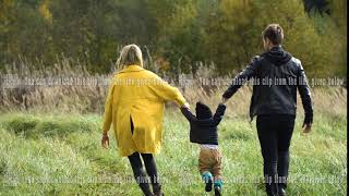 Young family on a walk in the park.