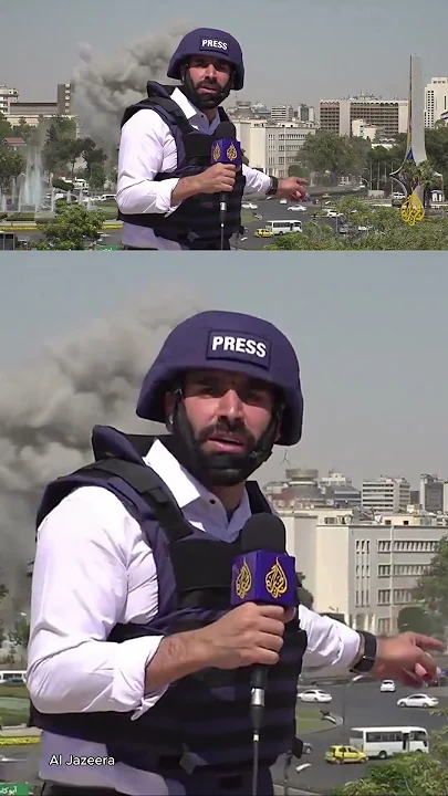 Syrian TV journalists are sent running for cover during live broadcast