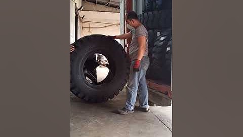 Unloading loader tires from 40 footer container van!