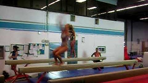 Madison Kramer- switch leap, split jump, back layout stepout