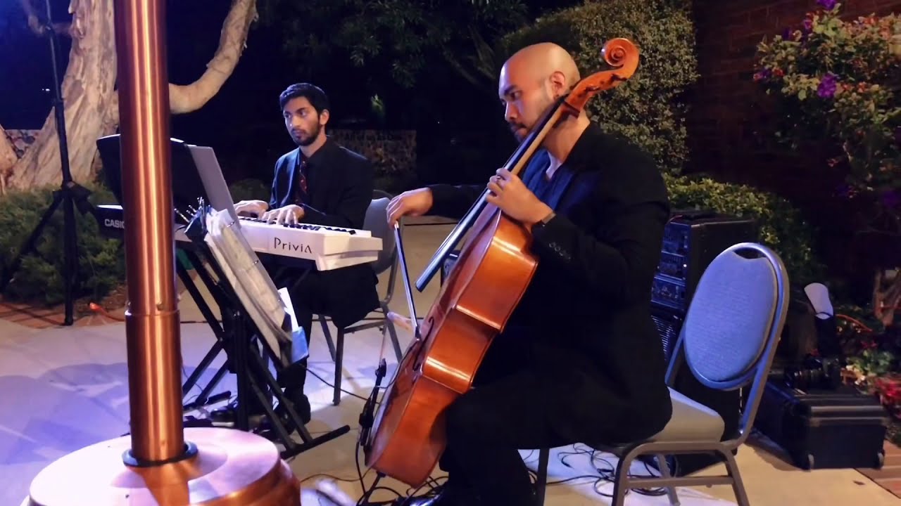 Piano Cello Duo Play During Cocktail Hour At Stephen Wise Temple In Los piano-cello-duo-play-during-cocktail-hour-at-stephen-wise-temple-in-los