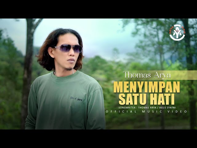 Thomas Arya - Menyimpan Satu Hati (Official Music Video) class=