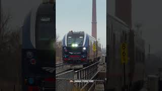 Amtrak Midwest Service in the rain at Mayfair, Chicago, IL