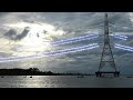 PolySure electric high voltage pylon against beautiful sky in dusk