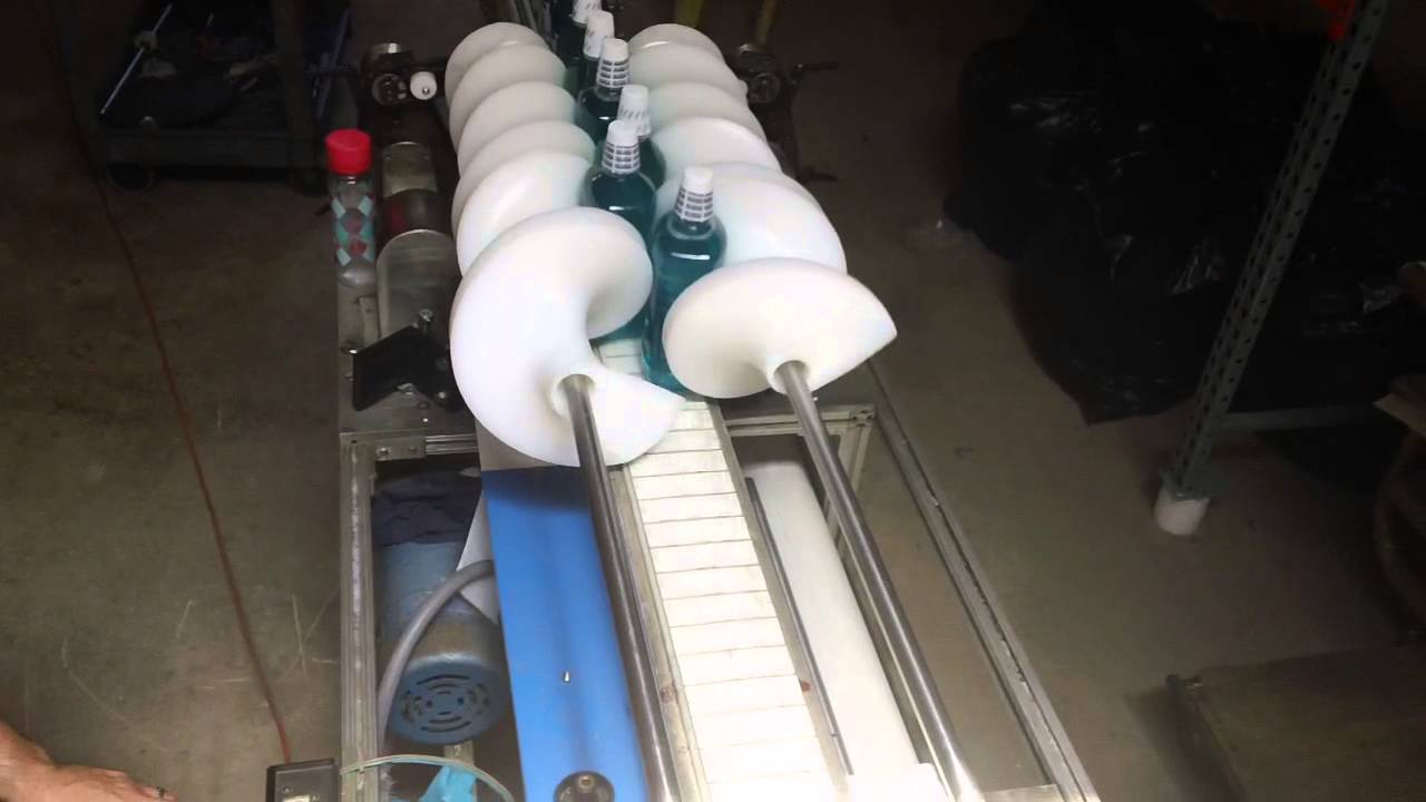 Carleton Helical Technologies - Feedscrews Turning Plastic Bottles