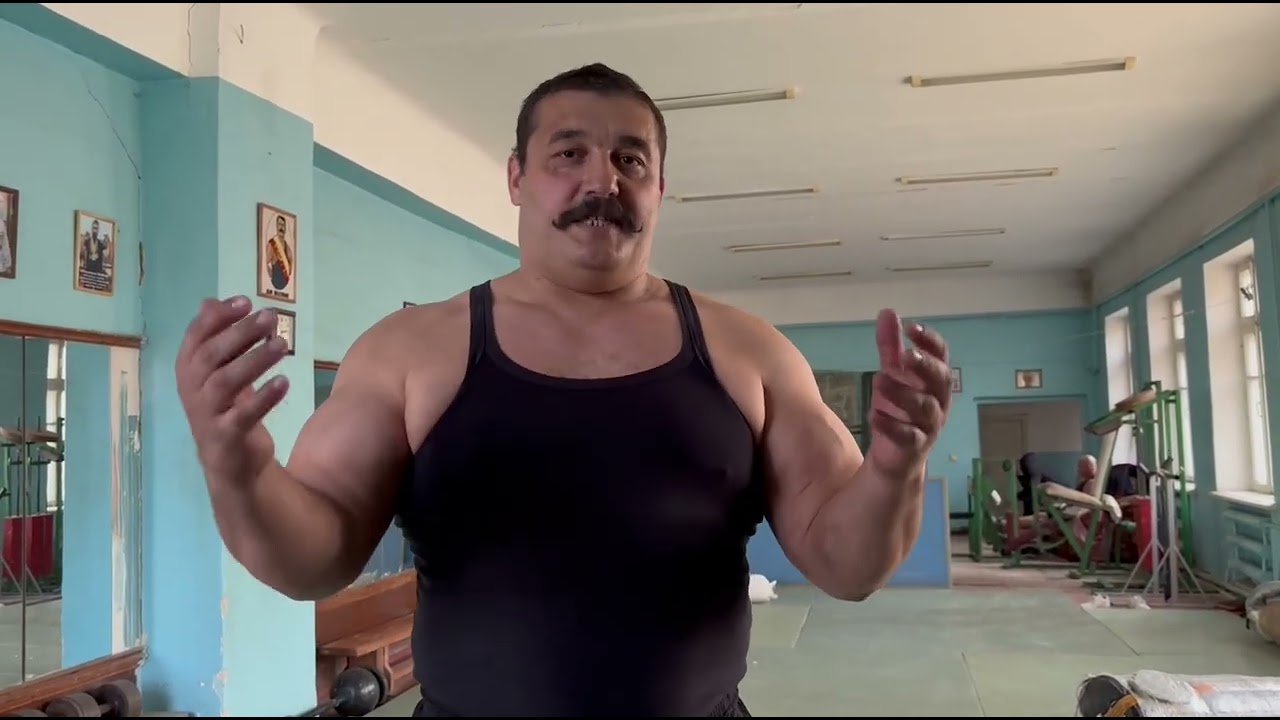 Жим мельницей на борцовском мосту на 60 повторений двух гирь по 32 кг. ДМИТРИЙ ХАЛАДЖИ