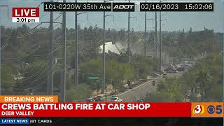 WATCH: Crews battle fire at a car shop in north Phoenix