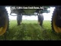 John Deere Sprayer operating in a soybean field