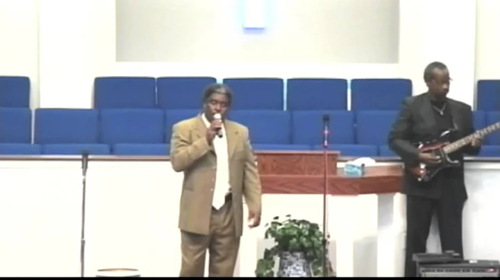 Pastor Ernest James Singing At Musical
