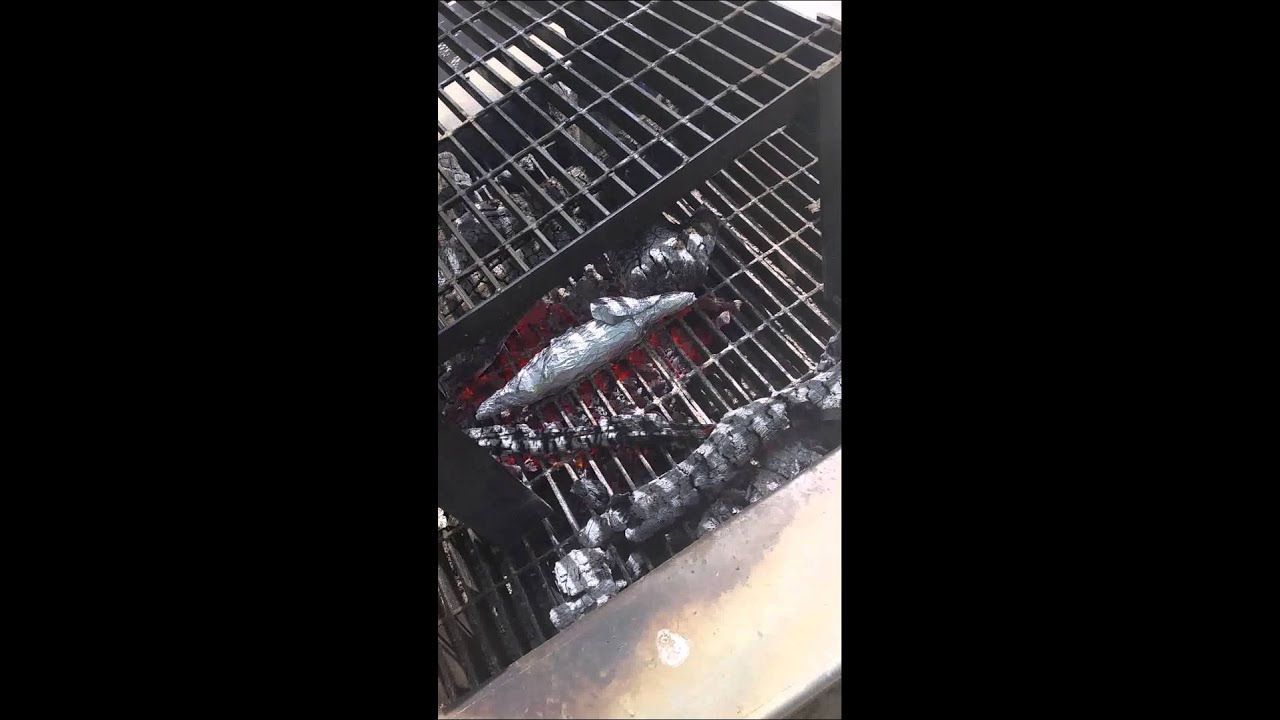 Putting the corn on the fire - YouTube