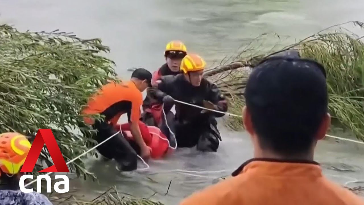 Bodies pulled from vehicles trapped in flooded tunnel in South Korea after heavy rain