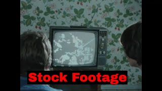 1980s STOCK FOOTAGE  CAT SCAN   CHRYSLER MINIVAN ASSEMBLY LINE   TEENS WATCHING TV  SF10035