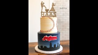 It's a baseball themed wedding cake for Fox 8 Zoom Wedding