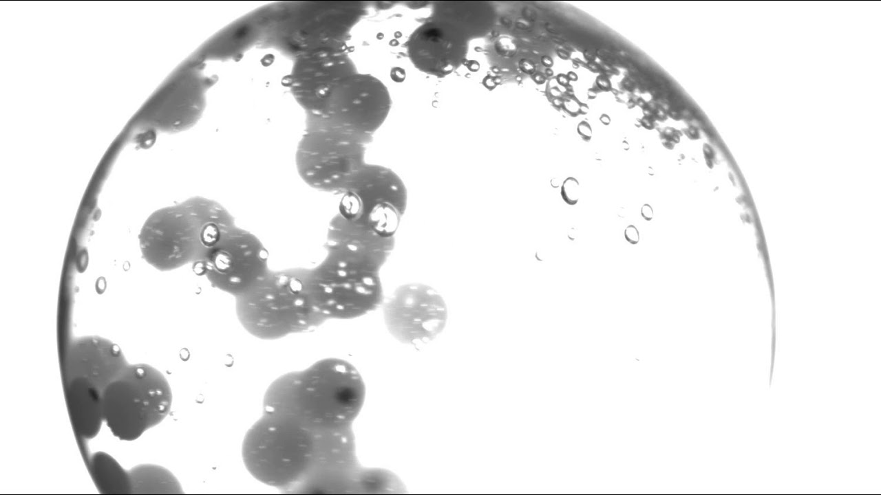 Orbiting sphere filled with air & water and 100 nylon particles 2000 rpm YouTube