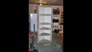 made this corner cabinet from set of bifold closet doors.