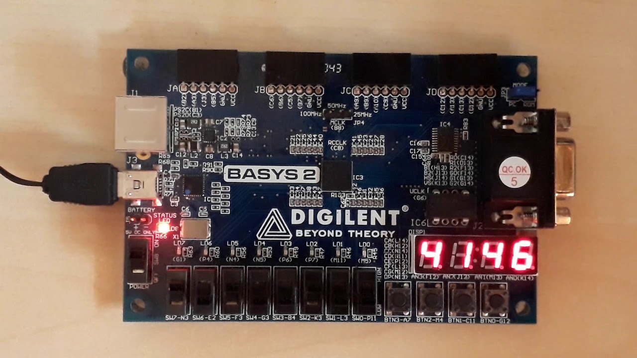 Clock with seven segment display coded in VHDL