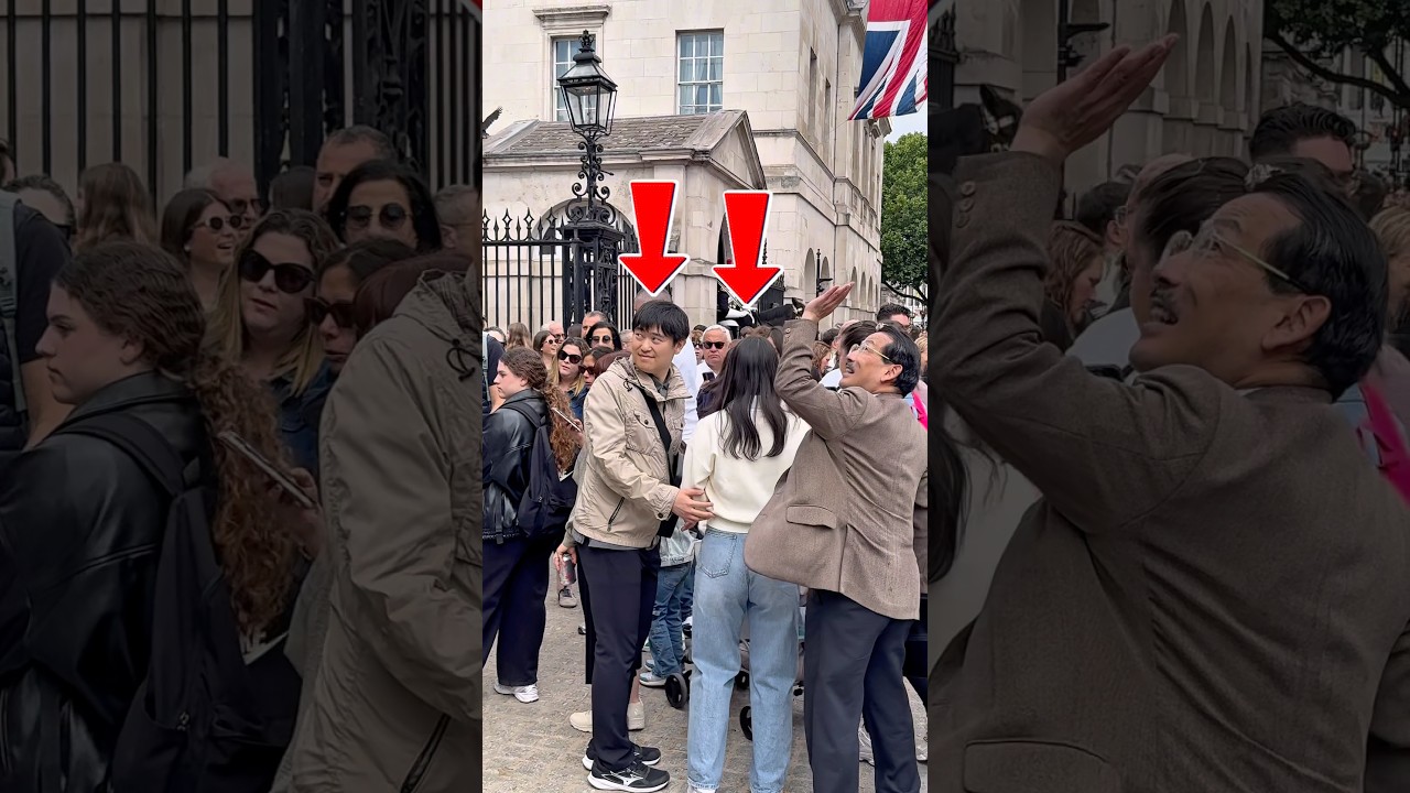 RESPECT IN ACTION: JAPANESE COUPLE BOWS TO ROYALTY AS TOURISTS ACKNOWLEDGE THE KING'S GUARD** 🇯🇵👑
