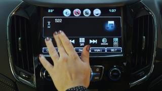 Astra Sedan - How do I stream music from my portable Bluetooth device?