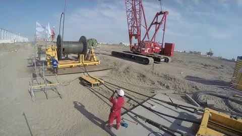 On-bottom shore-pull with linear winch, socket passing and drum change-over operations.