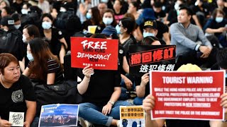 Thousands rally at Hong Kong airport to 'educate' visitors on alleged police violence