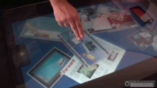 mTouch table  by  Merel  Technologies at CEA Line Show 2010 - BWOne.com Profile
