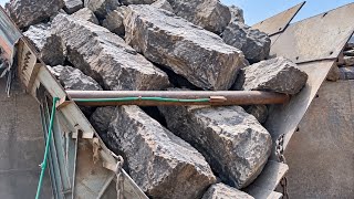 Massive Boulders Loaded Into A Rock Crusher Heavy Stone Crushing Machine