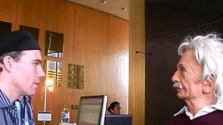 Celebrity TED 2009 - Austin Hill plays with Einstein robot from Hanson Robotics Wealth