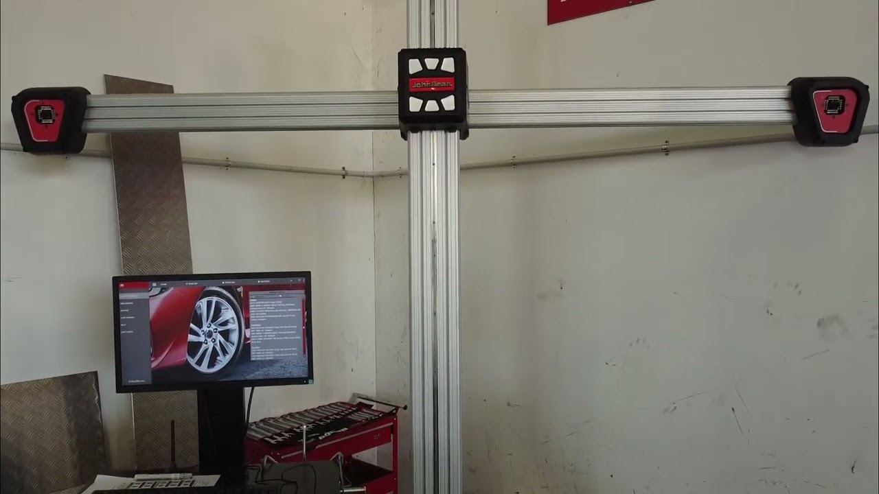 John beam V2280 Wheel Aligner & Forward Lift CR14E. Laurent Motors Matamata