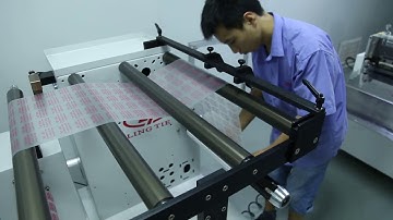 Web guide rewinding machine